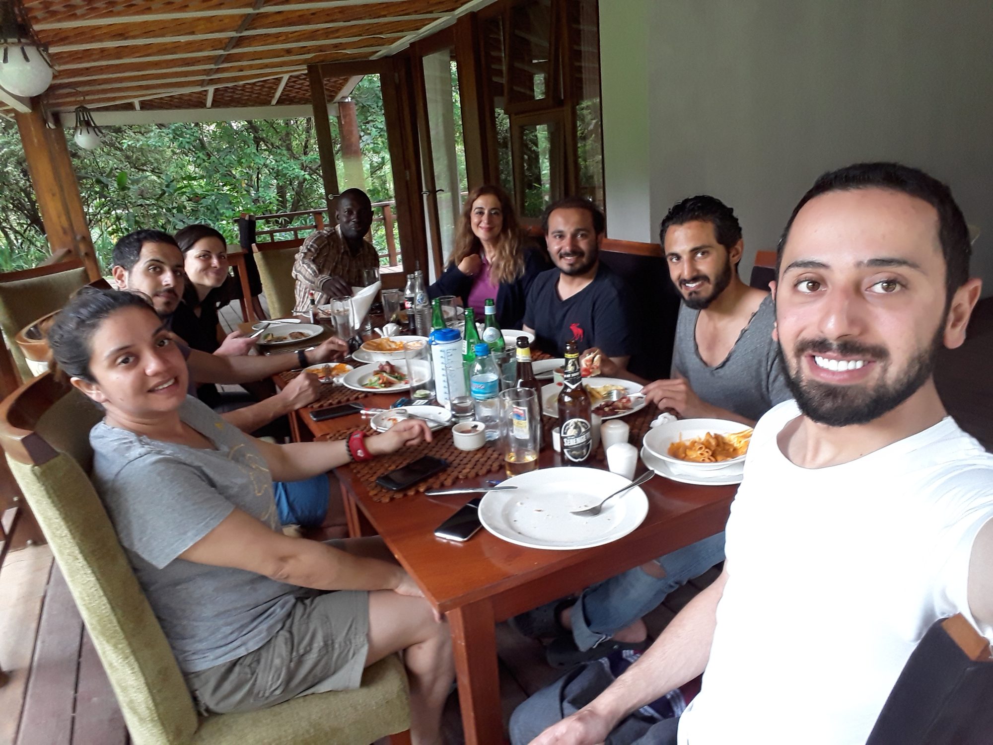 A team sharing a meal around a table